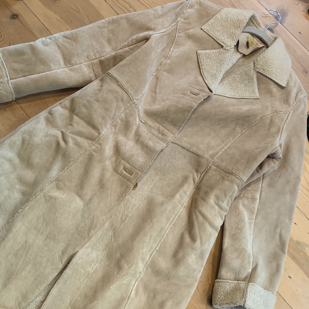 Genuine leather lines with shearling beige coat size M